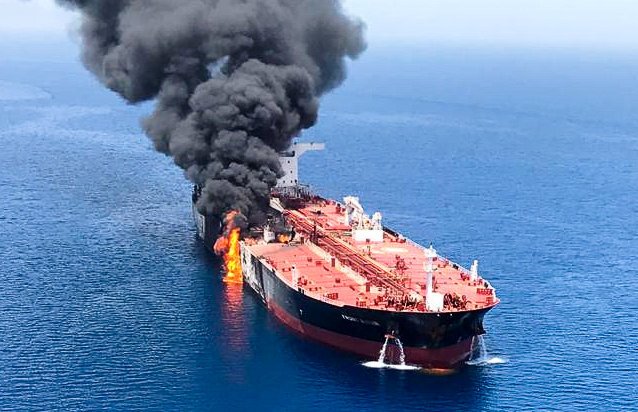 An oil tanker is seen after it was attacked at the Gulf of Oman Oil Tankers Explode : హర్మూజ్లో ఉద్రిక్తత.. పేలిన చమురు ట్యాంకర్లు!